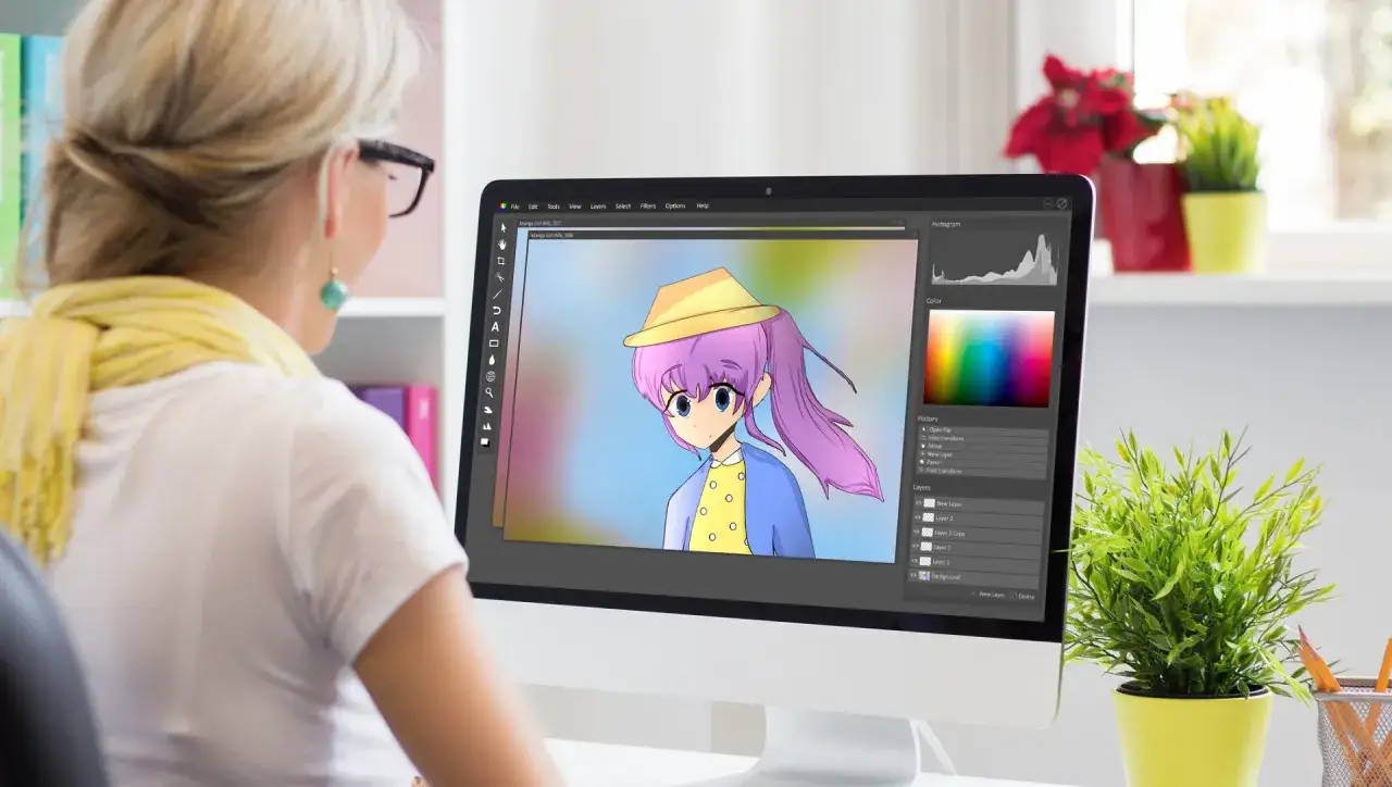 Kobieta pracuje jako animator, tworząc postać anime na komputerze.